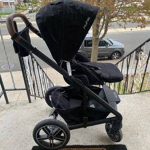 Black with brown leather handle Nuna Mixx